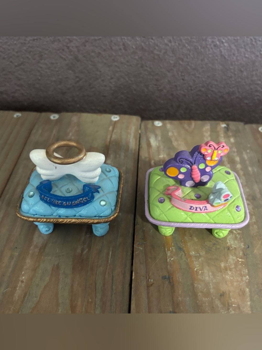 Y2K pair of Claire's light blue angel and green diva accessory holders